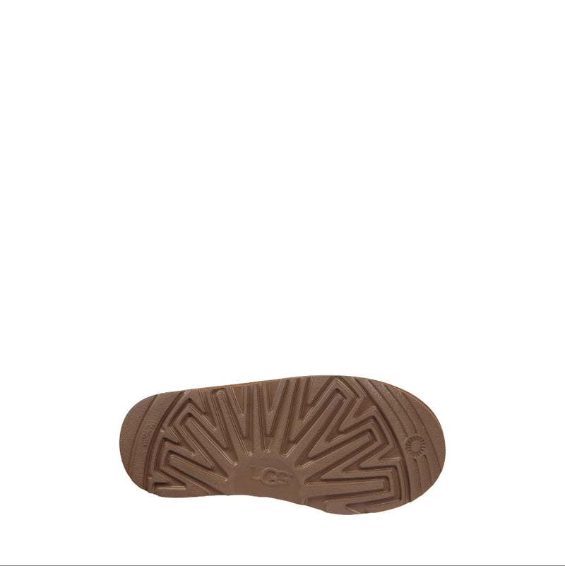 Brown sole of a shoe on a white background