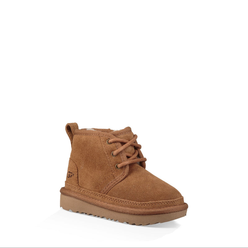 Brown children's boot on a white background