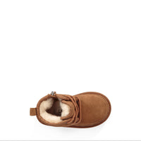 Brown suede baby boot with fur lining on a white background